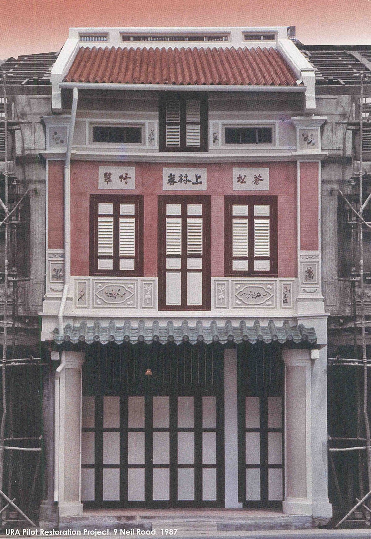 The restored façade of 9 Neil Road in 1987, with its red shutters and ornamental mouldings