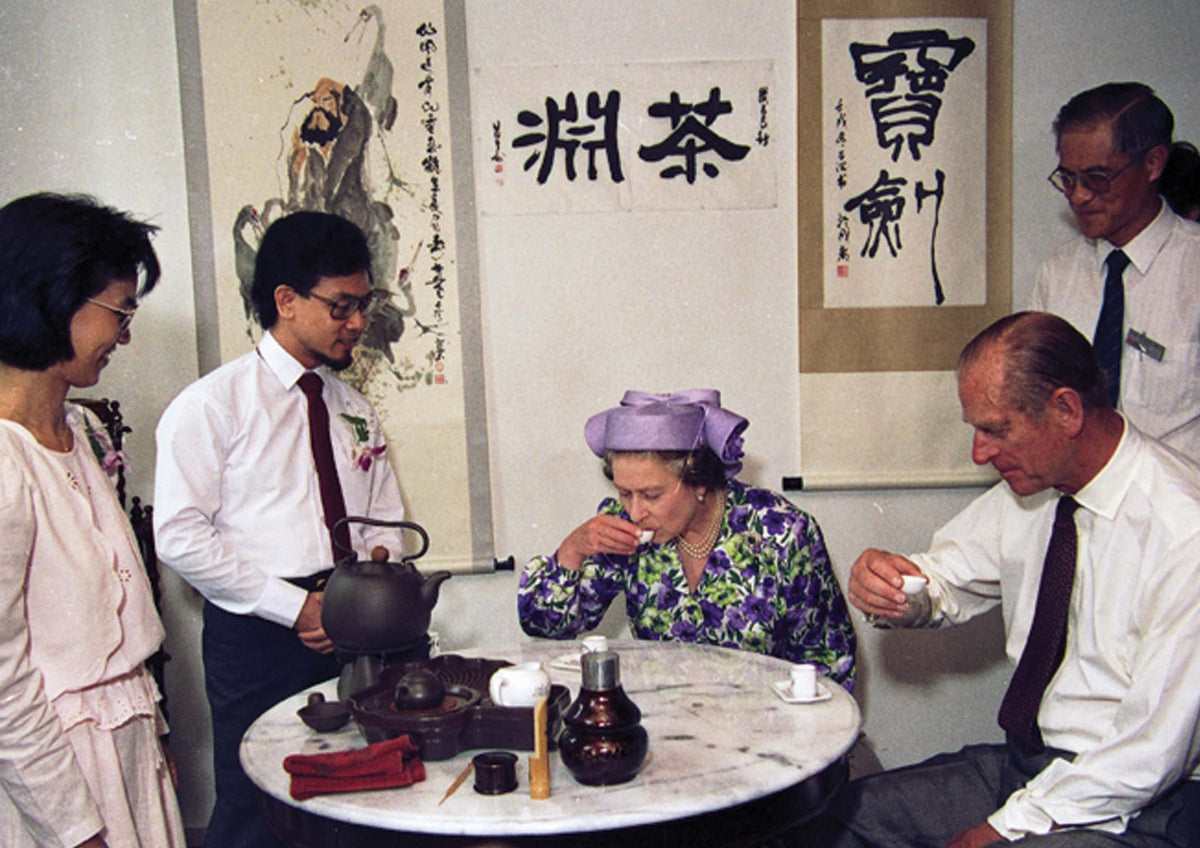 Queen Elizabeth II and Prince Philip taking tea at Tea Chapter, 10 October 1989