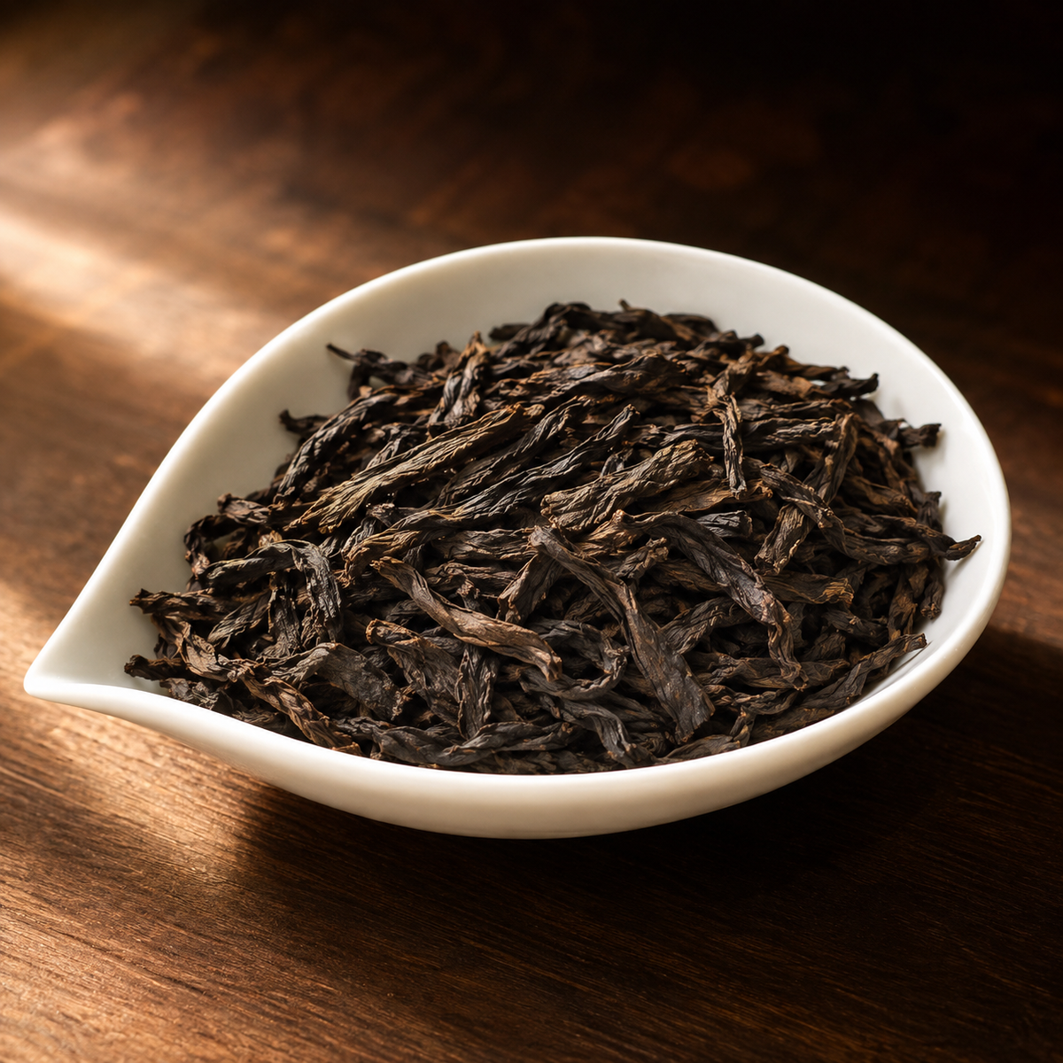 Iron Arhat in warm window light - Tea Chapter Singapore